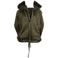 Army green anorak jacket in polished cotton designed by Phoebe Philo for Celine. French size M. Approximate measurements: shoulder 16" (however no defined shoulder), bust 48", waist (fully expanded) 46", arm length from underarm to cuff 18" and overall length 27". Slips on over the head. Adjustable button closure at wrists. Drawstring at waistline and in hood. Buttoned pockets at hips. Made in France. Excellent condition. Fringe Coats, Lace Coat, Green Silk Dresses, Silk Cocktail Dress, Designer Coats, Phoebe Philo, Black Knit Dress, Shopping Photography, Check Dress