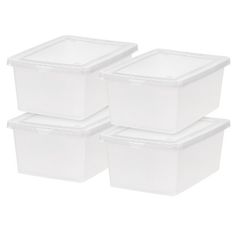 four plastic storage containers with lids