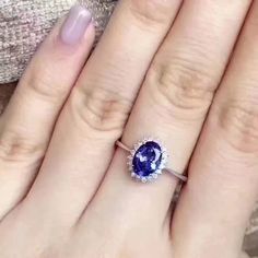 Welcome to Elegant Art Jewelry!  Stone: Tanzanite Stone Size:. 8mm×6mm Origin: Tanzania Side Stone:. Zirconia Metal: 925 Sterling Silver Plating: Platinum Plated, Rose Gold Plated, Gold Plated Personalization: 9K/14K/24K/GOLD/SILVER/PLATINUM/ROSE-GOLD/WHITE GOLD. (Contact me)  Tanzanite Ring, Tanzanite Cuff Ring, 925 Sterling Silver Ring, Oval Shape Ring, Tanzanite Ring, Tanzanite Engagement, Open Design Ring, Tanzanite Oval, Tanzanite Natural, Blue Tanzanite, Blue Gemstone, Gemstone Ring  All i Dazzling Tanzanite Rings For Gift, Oval Tanzanite Jewelry With Halo Design, Oval Tanzanite Halo Jewelry, Gift Tanzanite Ring With Halo Design, Tanzanite Halo Design Ring For Gift, Tanzanite Halo Design Ring As Gift, Oval Tanzanite Ring In White Gold, Gift Oval Sapphire Moissanite Ring, Exquisite Oval Tanzanite Rings