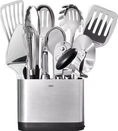 an assortment of kitchen utensils in a holder