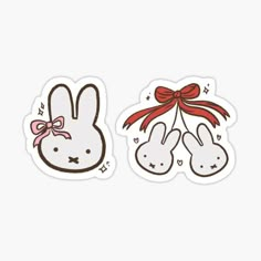 two bunny stickers with bows on their ears and one in the shape of a rabbit