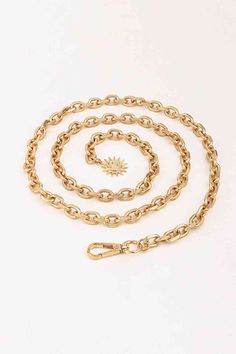 Material: Iron Imported Product measurements: 39.4*0.4 in Gold Metal Chain Belt With Chain Print, Gold Chain Metal Belt, Trendy Gold Chain Belt With Chain Strap, Trendy Gold Chain Belt, Gold Chain Link Belt As Fashion Accessory, Gold Chain Link Fashion Chain Belt, Gold Chain Link Chain Belt, Gold-tone Metal Chain Necklace With Chain Strap, Gold-tone Metal Chain Necklace