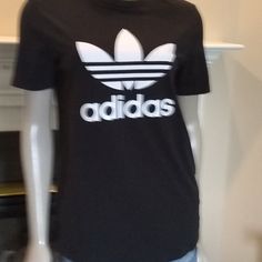 Nwot Adidas T-Shirt Size Large Traditional Style :) Bought But Never Wore! Trendy Adidas T-shirt With Letter Print, Adidas Logo Spring Crew Neck Top, Adidas Logo Crew Neck Top For Spring, Basic Adidas Logo Crew Neck Tops, Basic Adidas Crew Neck Tops, Spring Cotton Top With Adidas Logo, Adidas Cotton T-shirt With Letter Print, Adidas Logo Short Sleeve Tops For Summer, Casual Cotton Adidas T-shirt