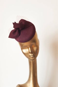 Please note that all items in my shop are made to order Unique Modern Burgundy Felt Fascinator. For parties and outdoors. Can be mounted on headband or with elastic rubber. Diameter : 16 cm Finished with lining and delicate petersham cotton grosgrain ribbon. Please send me convo after purchase. There are many positions you can wear it. If you need any info please contact me :) --------------------------- SHIPPING INFORMATION I will ship your purchased item within 3 business days after receiving Felt Fascinator, Ivory Fascinator, Pretty Hats, Derby Fascinator, English Wedding, Fascinator Headband, Millinery Hats, Royal Outfits, Floral Headpiece