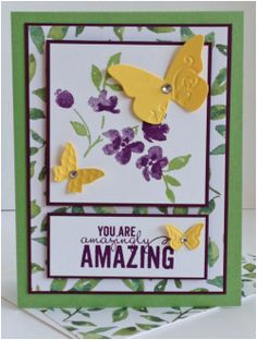 a card with some butterflies on it and the words you are amazing in purple, yellow and green