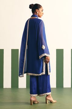 Buy Blue Kurta Organza Embroidery Geometric Irina Yoke Palazzo Set For Women by Reeti Arneja Online at Aza Fashions. Blue Palazzo Set With Resham Embroidery For Party, Blue Embroidered Long Sleeve Palazzo Set, Designer Blue Kurta With Intricate Embroidery, Silk Blue Kurta With Intricate Embroidery, Designer Blue Kurta For Formal Occasions, Designer Embroidered Blue Sets, Blue Silk Traditional Wear With Intricate Embroidery, Fitted Blue Palazzo Set With Intricate Embroidery, Blue Fitted Palazzo Set With Intricate Embroidery