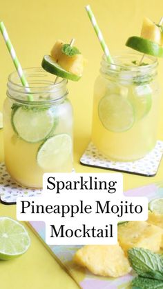 two mason jars filled with pineapple mojito cocktail