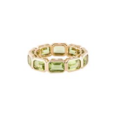 Band Width: 5.3mm Metal Type: 14K Yellow Gold Total Item Weight (g): 4.2 Gemstone: Peridot Carat Weight: 6.20 Stone Count: 10 Stone Shape: Emerald Cut Stone Color: Green Green Baguette Cut Stackable Rings, Yellow Gold Stackable Rings With Peridot, Elegant Green Peridot Stackable Rings, Stackable Yellow Gold Peridot Jewelry, Elegant Peridot Gemstone Stackable Rings, Yellow Gold Peridot Stackable Rings For Wedding, Green Stackable Eternity Band For Formal Occasions, Elegant Peridot Stackable Rings For May Birthstone, Peridot Wedding Band