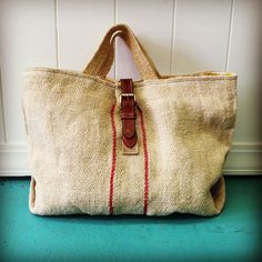 a bag sitting on top of a blue table