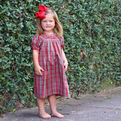 Create joyful memories with our Merry and Bright Plaid Smocked Dress. This green and red plaid dress is the perfect choice for your Christmas celebration. The dress features delightful geometric smocking and elegant bishop sleeves adorned with red ric-rac trim. Geometric Smocking, Toddler Christmas Outfit, Red Plaid Dress, Christmas Celebration, Toddler Christmas, Ric Rac, Holiday Memories, Smocked Dress, Plaid Design