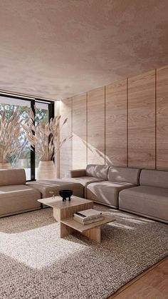 a modern living room with wood paneling and floor to ceiling windows overlooking the outdoors