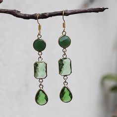 These cute hand-crafted faceted green multi-tier Crystal Earrings come in multiple designs Stone: Crystal Colour: Green Metal: Gold Plated Earring Size: 3 crystals: 7.5cm Drop x 1.2cm Width                          2 crystals: 6cm Drop x 1.2cm Width Handmade Green Crystal Drop Earrings, Green Gemstone Drop Crystal Earrings, Green Crystal Earrings For May Birthstone Gift, Green Crystal May Birthstone Earrings For Gift, Green Dangle Crystal Earrings For Gift, Green Faceted Drop Earrings, Nickel-free Green Drop Crystal Earrings, Green Faceted Earrings For May Birthstone, Green Metal