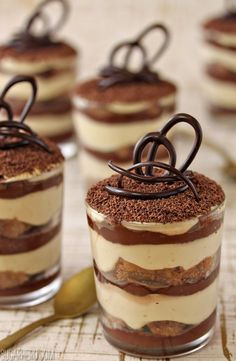 chocolate tirami desserts in small glass jars