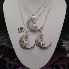 Feel the Magic of the moon when you wear this Luminous Moonlight Necklace. Wear this glow-in-the-dark piece either casual or dressy. Enhance your goddess look and pair with our Chokers, Bracelets, Earrings, and Rings. Truly Magical! Details: Fashion Jewelry Glow-in-the-dark Stones Pendant Size: 3.2 x 3.5cm Place under flashlight or sunlight for 20-30 minutes, the longer the better. Chain Length: 45cm White Moon Shaped Mystical Necklace, Mystical Moon Shaped White Necklace, Mystical White Moon Necklace, Mystical White Moon-shaped Necklace, Silver Moon-shaped Halloween Jewelry, White Bohemian Jewelry With Sun And Moon Design, Bohemian White Jewelry With Sun And Moon Design, Luminous Jewelry For Gift, Bohemian White Moon-shaped Jewelry