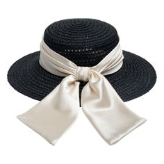 Black textured hemp boater with ivory shiny satin ruched band and tails. Measurements: 6.5" X 2.75" X 3.25" One Size. SKU: 21018-13124 Chic Adjustable Boater Hat With Bow, Chic Brimmed Boater Hat With Bow, Chic Short Brim Straw Hat With Bow, Elegant Boater Hat With Bow And Short Brim, Chic Straw Hat With Bow And Short Brim, Chic Straw Hat With Bow, Chic Summer Top Hat For Formal Occasions, Chic Boater Hat With Curved Brim And Bow, Chic Boater Hat With Bow And Curved Brim