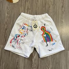 Limited Edition Fewocious Nft Artist Collaboration For Madhappy Super Soft White Fleece Sweatpant Shorts With All Over Hand Painted Print Design By Fewocious Size M Oversized Fit Matching Crewneck Available White Casual Pants With Graphic Print, Casual White Pants With Graphic Print, Trendy White Sweatpants For Streetwear, White Cotton Pants With Graphic Print, White Streetwear Bottoms With Elastic Waistband, White Relaxed Fit Bottoms With Graphic Print, Trendy White Cotton Sweatpants, Trendy White Bottoms With Graphic Print, Trendy White Streetwear Shorts