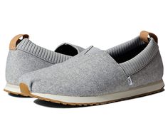 TOMS Alpargata Resident - Men's Shoes : Frost Grey : For information on how TOMS contributes to the community, please visit the Step out in comfort wearing the TOMS Alpargata Resident Shoes, perfect for everyday wear. Textile upper, lining, and insole. Removable OrthoLite Eco LT Hybrid insole for enhanced cushioning. Slip-on style. Signature brand name logo patch on the upper. Knit collar for added comfort. Round toe. Pull tabs for added practicality. EVA midsole. Man-made outsole with added tra Comfortable Gray Slip-ons With Flat Heel, Comfortable Gray Flat Heel Slip-ons, Comfortable Gray Flat Slip-on Sneakers, Comfortable Gray Slip-on Flat Sneakers, Comfortable Textile Walking Shoes With Cushioned Footbed, Gray Slip-on Sneakers With Cushioned Footbed, Comfortable Gray Slip-ons With Ortholite Insole, Comfortable Gray Slip-on Sneakers With Cushioned Footbed, Comfortable Textile Slip-ons With Woven Sole