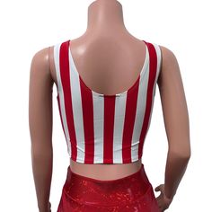 Made of our red stripe print spandex w/ red mesh inset in the front, this crop tank top fits snug to the body with plenty of stretch. Wear this to a rave, to the club, a rave, to a festival, or a night out. Also great for running, yoga, roller derby, or any activity.*We can make this top in any of our available fabrics - you can request the custom fabric choices in the personalization box if you prefer something other than what is shown in this listing. White Sleeveless Crop Top For Club, White Stretch Tank Top For Club, Stretch Crop Top Tank For Club, Stretch Cropped Tank Top For Club, Red Summer Tank Top For Club, Red Tank Top For Summer Clubbing, Summer Club Tank Crop Top, Summer Club Top With Racerback, Summer Racerback Top For Club