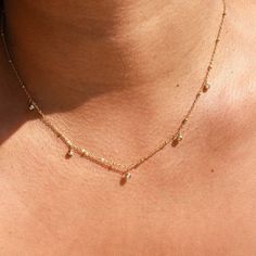 • Single Necklace• Gold Plated Stainless Steel PVD• Chain Length: 16" + 2" extender• Bezel Cubic Zironias Gold Necklaces Aesthetic, Single Necklace, Jewellery Aesthetic, Necklaces Gold, Dangle Necklaces, Cz Diamond, Necklace Gold, Chain Lengths, Chain Length