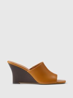 These wedge heels are made with vegan leather upper.  Wedge heel.  For more fit and sizing info, check out our Size Guide. Leather Wedges, Wedge Heels, Size Guide, Vegan Leather, Leather Upper, Wedges, Heels, Leather