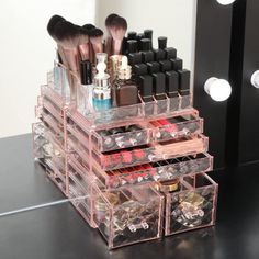 the makeup organizer is organized and ready to be used