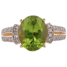 Elevate your jewelry collection with this exquisite Oval Peridot Ring, featuring a stunning oval-shaped peridot gemstone and sparkling diamond accents with a total carat weight (TCW) of 0.40. Crafted in luxurious 14K yellow gold, this ring is a harmonious blend of elegance and natural beauty. Diamond: 0.40 total carat weight (TCW) Gemstone: Oval Peridot The peridot's green hue represents renewal and vitality. Secure it today and experience the allure of this exceptional piece. Selling Price $500 Gold Oval Ring, Peridot Green, Sparkling Diamond, Oval Rings, Peridot Ring, Peridot Gemstone, Jewelry Rings Engagement, Sparkle Diamonds, Ring Verlobung