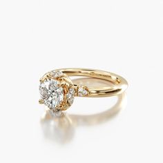 a yellow gold engagement ring with two diamonds