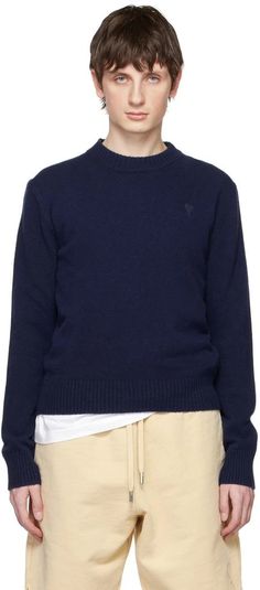 AMI Paris.Navy Ami de Cœur Sweater.Knit virgin wool sweater..· Rib knit crewneck, hem, and cuffs.· Logo embroidered at chest.Supplier color: Nautic blue.100% virgin wool..Made in Italy..231482M201013 Wool Crew Neck Polo Sweater, Wool Crew Sweater With Ribbed Cuffs, Winter Crew Neck Polo Sweater, Navy Crew Neck Sweater For Winter, Navy Wool Sweater With Ribbed Cuffs, Casual Wool Crew Sweatshirt, Casual Navy Merino Wool Sweater, Navy Wool Crew Neck Sweater, Classic Navy Sweatshirt For Winter