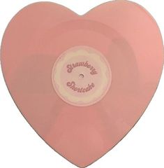 a pink heart shaped vinyl record with the words sunshine records on it's side