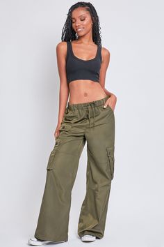 Every day is a new chance to wear our Women’s Relaxed Fit Cargo Pants. This high-waisted nylon pant features a relaxed fit for both style and comfort, ensuring you’ll look good and feel good throughout the day. Includes classic front pockets, three cargo pockets with button closures, and faux back pockets for maintaining a smoothing effect on your bum. These trendy pants are detailed with metal d-rings on the front belt loops and a drawstring waist so you can adjust the fit to your liking. Style Fit Cargo Pants, Ymi Jeans, Trendy Pants, Nylon Pants, Women Lifestyle, Lounge Shorts, Elastic Waist Shorts, Mom Shorts, Linen Women