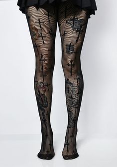 you've got 'em on their knees, praying. These fishnet tights have a body huggin' fit with gothic style crosses all over. Gothic Black Tights For Alternative Fashion, Gothic Stretch Tights, Black Gothic Tight Bottoms, Edgy Black Tights, Gothic Stretch Tights For Alternative Fashion, Black Fishnet Thigh-high Hosiery, Black Punk Hosiery For Alternative Fashion, Black Fishnet Thigh High Hosiery, Fitted Black Punk Style Tights