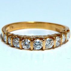 Channel Cathedral Band. .70ct. Natural Round Cut Brilliant Diamonds Durable Built. Vs-2 Clarity G Color. 18kt Yellow Gold. 2.7 Grams Overall Ring: 3.3mm Diameter Depth: 4.5mm Current Ring Size: 6.75 May Professionally Resize, Please Inquire. Classic Yellow Jewelry With Single Cut Diamonds, Classic Yellow Diamond Ring For Formal Events, Classic Yellow Diamond Ring For Formal Occasions, Classic Yellow Diamond Ring With Vvs Clarity, Classic Yellow Diamond Ring With Round Cut, Moissanite Engagement Ring Halo, Purple Gems, Fancy Yellow Diamond, Baguette Diamond Rings