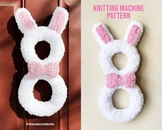 a pair of knitted bunny ears hanging on a wall next to a sewing machine pattern