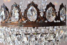 a close up of a tiara with lots of diamonds