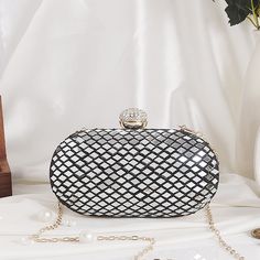 Beautiful Evening/Daytime Clutch for any event as the mirror work and black and white tones can be used throughout any season with any outfits! The bag is beautiful with mirror work and comes in two colors to complete the look! Party Black Clutch With Sequins, Elegant Black Sequined Evening Bag, Chic Formal Sequin Shoulder Bag, Elegant Party Clutch With Mirror Work, Glamorous White Party Bags, Elegant Party Shoulder Bag With Mirror Work, Elegant Evening Bags With Mirror Work, Elegant Evening Bag With Mirror Work, Evening Clutch With Mirror Work