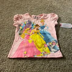 I Am Selling A New With Tags Disney Princess Short Sleeve Shirt Size 5. Great For This Spring And Summer. Comes From A Non Smoking And Pet Free Home. Disney Pink Tops With Character Print, Pink Disney Cotton Top, Disney Pink Tops With Cartoon Print, Pink Cotton Disney Top, Pink Disney Cartoon Print Top, Disney Princess Shirt, Girl Hood, Disney Princess Shirts, Princess Shirt