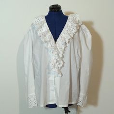 Very nice original folk blouse, with lovely lace embellishment. The blouse is old but in very good condition. The size is app. 48/XL Measurements: Bust: 122cm Waist: 114cm Length: 66cm Sleeve length: 64cm White Long Sleeve Blouse With Lace Collar, Fall Long Sleeve Broderie Anglaise Blouse, Long Sleeve Broderie Anglaise Blouse For Fall, Broderie Anglaise Long Sleeve Blouse For Fall, Cottagecore Long Sleeve Blouse With Lace Collar, Long Sleeve Blouse With Lace Trim For Daywear, Long Sleeve Lace Blouse For Daywear, White Bohemian Blouse With Lace Cuffs, Long Sleeve Shirt With Lace Collar For Daywear