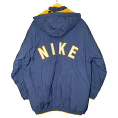 Vintage 1990s Nike blue yellow detachable hood zippered winter coat jacket  Great preowned condition Tagged adult large, fits l/xl 29″ Pit to pit 32″ Top to bottom 90s Winter Outerwear With Drawstring Hood, Yellow Windbreaker With Detachable Hood For Winter, 90s Style Hooded Winter Track Jacket, 90s Style Hooded Track Jacket For Winter, 90s Hooded Track Jacket For Winter, 90s Hooded Winter Track Jacket, Yellow Windbreaker With Adjustable Hood For Winter, Blue Streetwear Parka With Double-lined Hood, Blue Parka With Double-lined Hood For Streetwear