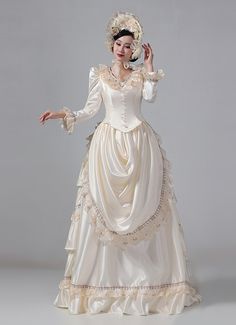 White Edwardian Victorian Bustle Satin Dresses Women Masquerade Ball Dresses     Condition: Brand New   Color:White   Material: This dress made of High Quality Satin,Lace, soft,smooth and comfortable to wear   Sleeve Length:Long Sleeve   Dresses Length:Floor-Length   Neckline:V-Collar   Decoration: Ruffles + Lace   Applicable People:Adult   Package Includes: Dress    amp;nbsp;     The length of skirt about 45 inches (114 cm) long from waist to hem regardless of size. This dress is pictured with Fitted Beige Maxi Dress For Banquet, Fitted Beige Gown For Banquet, Elegant Floor-length Victorian Dress For Costume Party, Beige Floor-length Dress For Banquet, Floor-length Cream Dress For Banquet, Beige Satin Dress For Banquet, Cream Floor-length Dress For Banquet, Floor-length Cream Evening Dress For Banquet, Cream Floor-length Evening Dress For Banquet