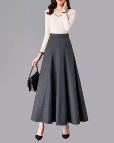 * A high-end long wool skirt with wide hem, very cool. * Made of wool blends, fully lined and with two side pockets. * Fixed waist and side invisible zipper. * Can custom make waist size and skirt length. * Material: Outer-50% wool, 50% polyester; lining-100% polyester * Washing instructions: Dry Clean Only * Size: True to US size, US 0-US 20 are available, you can let us know your usual size and height in your order. * Shipping: Free shipping Processing time : 5-7 Business days Delivery time : Chic A-line Maxi Skirt For Winter, Chic A-line Maxi Skirt For Fall, Elegant Fall Maxi Skirt With Pockets, Fall Maxi Skirt With Pockets, Elegant Wide Leg Maxi Skirt For Fall, Chic Full Maxi Skirt For Winter, Flowy Full Maxi Skirt For Fall, Wool Flared Maxi Skirt For Work, Winter Workwear Flared Maxi Skirt