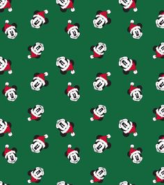 a green background with white and red mickey mouses on it's faces, all in santa hats