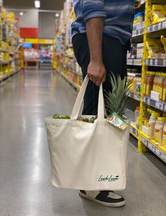 Eco-Friendly Cotton Tote Grocery Bag - Sustainable, Durable & Stylish -- **LIMITED TIME OFFER Get a bonus Cotton mesh bag with every purchase! -- 1 White bag + 1 Black bag Discover the perfect blend of style, sustainability, and functionality with our premium cotton tote grocery bags. Designed for the eco-conscious shopper, these bags are not just a statement but a commitment to a greener planet. 🌿 100% Pure Cotton: Crafted with the finest quality cotton, ensuring a durable and long-lasting com Eco-friendly Shopping Bag With Pockets, Eco-friendly Large Capacity Bag For Market, Eco-friendly White Canvas Grocery Bag, Eco-friendly Tote Bags For Grocery Shopping, Eco-friendly Reusable Canvas Grocery Bag, Grocery Tote Bag, Grocery Tote, Eco Bag, Reusable Grocery Bags