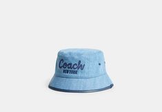 Coach 1941 Embroidered Denim Bucket Hat | COACH Casual Summer Bucket Hat With Flat Bill, Vintage Cotton Bucket Hat With Flat Brim, Casual Bucket Hat With Embroidered Logo And Short Brim, Casual Bucket Hat With Embroidered Logo And Flat Brim, Casual Bucket Hat With Embroidered Logo, Casual Spring Bucket Hat With Embroidered Logo, Trendy Bucket Hat With Embroidered Logo, Denim Bucket Hat, Coach 1941