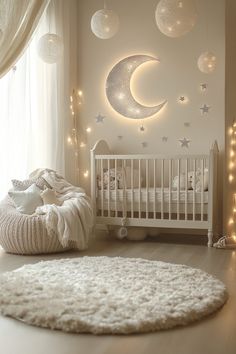 a baby's room decorated in white with stars and moon decorations