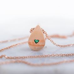 Fabulous, elegant and subtle 14k gold necklace with beautiful green emerald . The emerald gemstone is natural, Earth mined. It comes from Colombia. This emerald necklace is one of a kind. You are buying the necklace which is pictured. In the back of the gold necklace- tiny heart- symbol of LOVE This emeral necklace may be a perfect gift for her for birhtday, anniversary, Christmas, graduation or any other occasion. Central stone: *natural, pear shaped, Earth mined emerald - beautiful green color Elegant Emerald Teardrop Necklace, Formal Drop Emerald Necklace, Drop Emerald Necklaces For Formal Occasions, Emerald Drop Necklace For Formal Occasions, Heart Shaped Emerald Necklace As A Gift, Heart-shaped Emerald Necklaces As A Gift, Heart-shaped Emerald Necklace As A Gift, Heart-shaped Emerald Necklace For Gift, Emerald Teardrop Pendant Necklace For Weddings