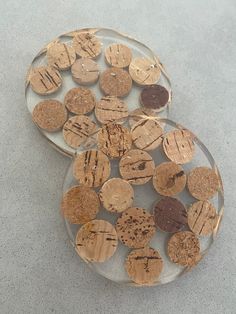 two glass plates with corks on them