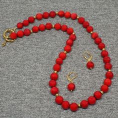 Beaded Gemstone Necklace Description: •Natural Gemstone Beads: Red Coral (10mm round)•Approximate Length: 21"  •Clasp:  Gold Toggle       •Coordinating Earrings Included •Free Domestic Shipping – Arrives in Gift Box – Gift Wrapping AvailableThe beaded necklace is handmade custom designed using precious natural gemstones artistically designed into the unique one of a kind statement necklace. This is the exact necklace you will receive when purchased.Each necklace is handmade by me from inception Luxury Red Coral Gemstone Necklace, Luxury Red Coral Beaded Necklaces With Gemstone Beads, Luxury Red Coral Round Beaded Necklaces, Luxury Necklace With Round Red Coral Beads, Red Beaded Necklaces With Natural Stones, Red Coral Jewelry With Natural Stones In Round Beads, Red Coral Jewelry With 8mm Beads, Red Jewelry With Faceted Beads, Red Coral Round Beads For Jewelry Making