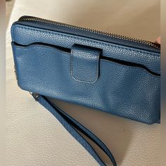 Beautiful Wristlet/Wallet. Never Used Size 8”/4.5” Blue Travel Clutch With Mobile Phone Bag, Blue Clutch With Mobile Phone Bag For Daily Use, Blue Mobile Phone Bag Clutch For Daily Use, Blue Rectangular Clutch With Cell Phone Pocket, Blue Rectangular Clutch With Phone Pocket, Blue Clutch With Cell Phone Pocket, Blue Wristlet With Zipper Pouch For Daily Use, Blue Wristlet With Removable Pouch For Travel, Blue Clutch With Zipper Pouch