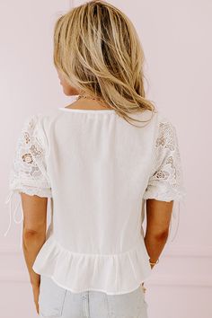 - This top is perfect for a stylish look at brunch with the girls! - Lightweight, material with crochet accents and a built-in bodice lining - A deep-v neckline - Short puff sleeves with elastic cuffs and tie accents - A ruffled under-bust - A figure flattering silhouette that ends in a subtly ruffled hemline Measurements S : Bust 32", Hip 44", Length 18", Sleeve Length 11", Waist 34". M : Bust 34", Hip 48", Length 19", Sleeve Length 11.5", Waist 36". L : Bust 38", Hip 48", Length 19", Sleeve Le Spring V-neck Peasant Top With Smocked Back, Feminine V-neck Puff Sleeve Top With Ruffles, Spring V-neck Peasant Top With Smocked Cuffs, Chic Smocked V-neck Top With Ruffles, Feminine V-neck Smocked Top With Ruffles, Embroidered Top, Women Clothing Boutique, Hip Length, Online Womens Clothing