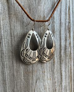 Earrings with a great 70's Southwestern Vibe!Super cool vintage Navajo Style, cast in luxurious white bronze and heavily plated in Sterling Silver. Stamp-work is hand inked, bringing the cool designs out, then finished with a silver brushed finish.2 1/4" in length measuring only the earrings2 1/2" in length including French wiresEarrings come with French wires ~ If you would like them on posts (Nickel Free) just choose POST from the "Select An Option" drop-down menuFree Shipping in the US :-) *C French Wire Earrings, Navajo Style, Pearl Leather, Leather Chokers, Vintage Navajo, French Wire, Cool Vintage, Wire Earrings, Earrings Vintage